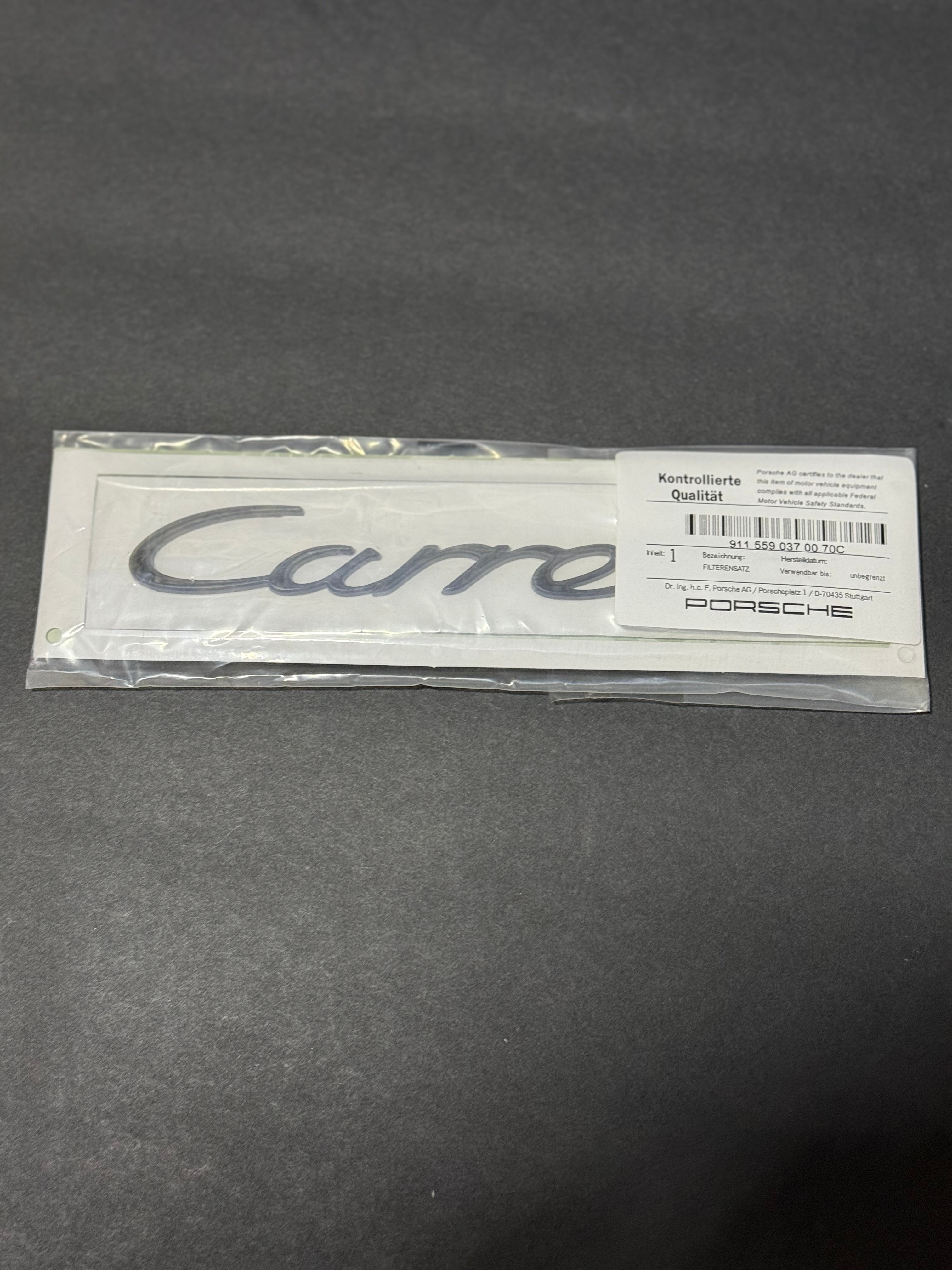 911 559 037 00 70C Genuine Porsche 911 964 "CARRERA" Emblem Insignia Logo Script Rally Black.