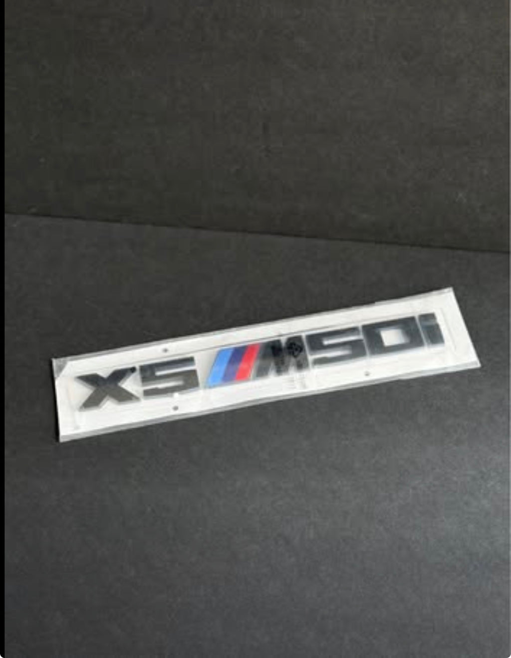 NEW GENUINE G05 X5 M50I BLACK TRUNK EMBLEM LETTERING DECAL BADGE.